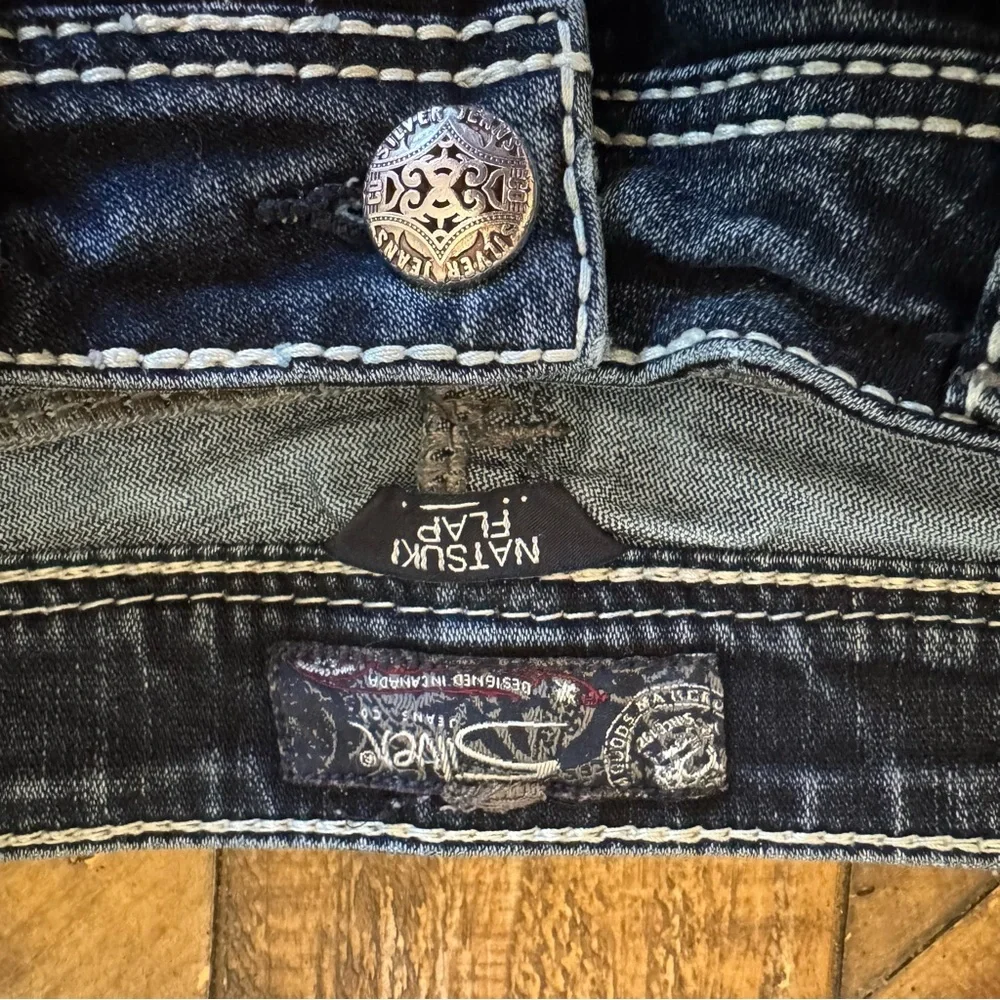 Women’s silver jeans size 8